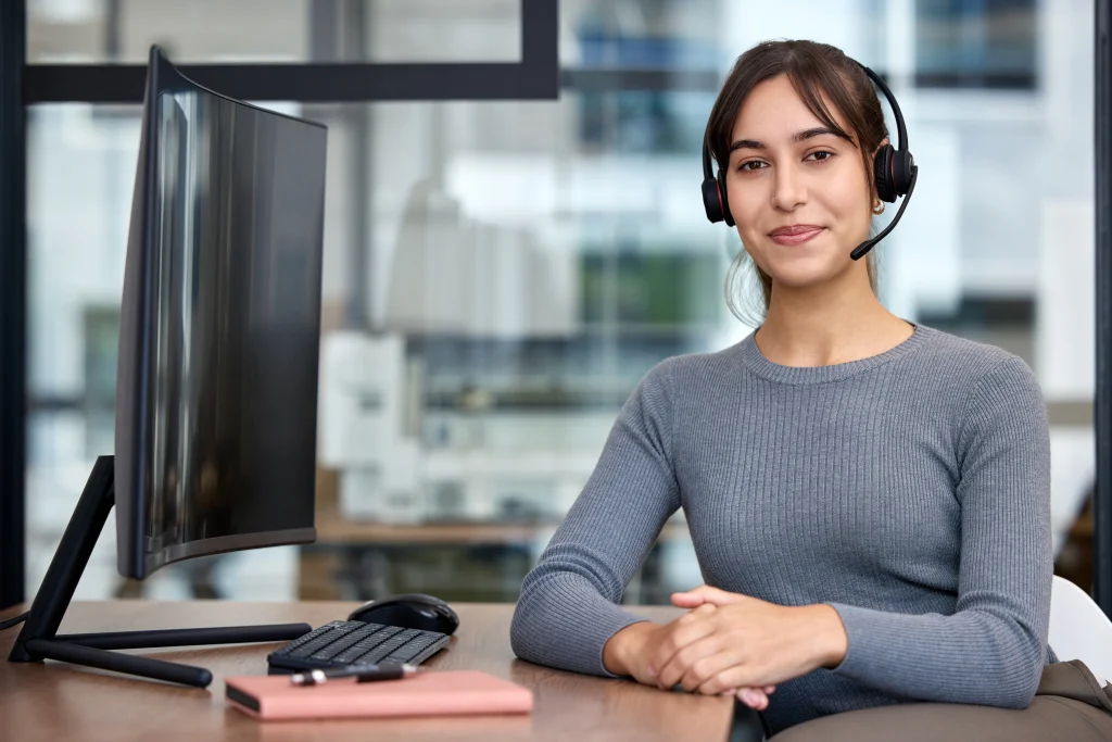 Shot of a young businesswoman working on a computer in an office. Contact Tbourke Solutions