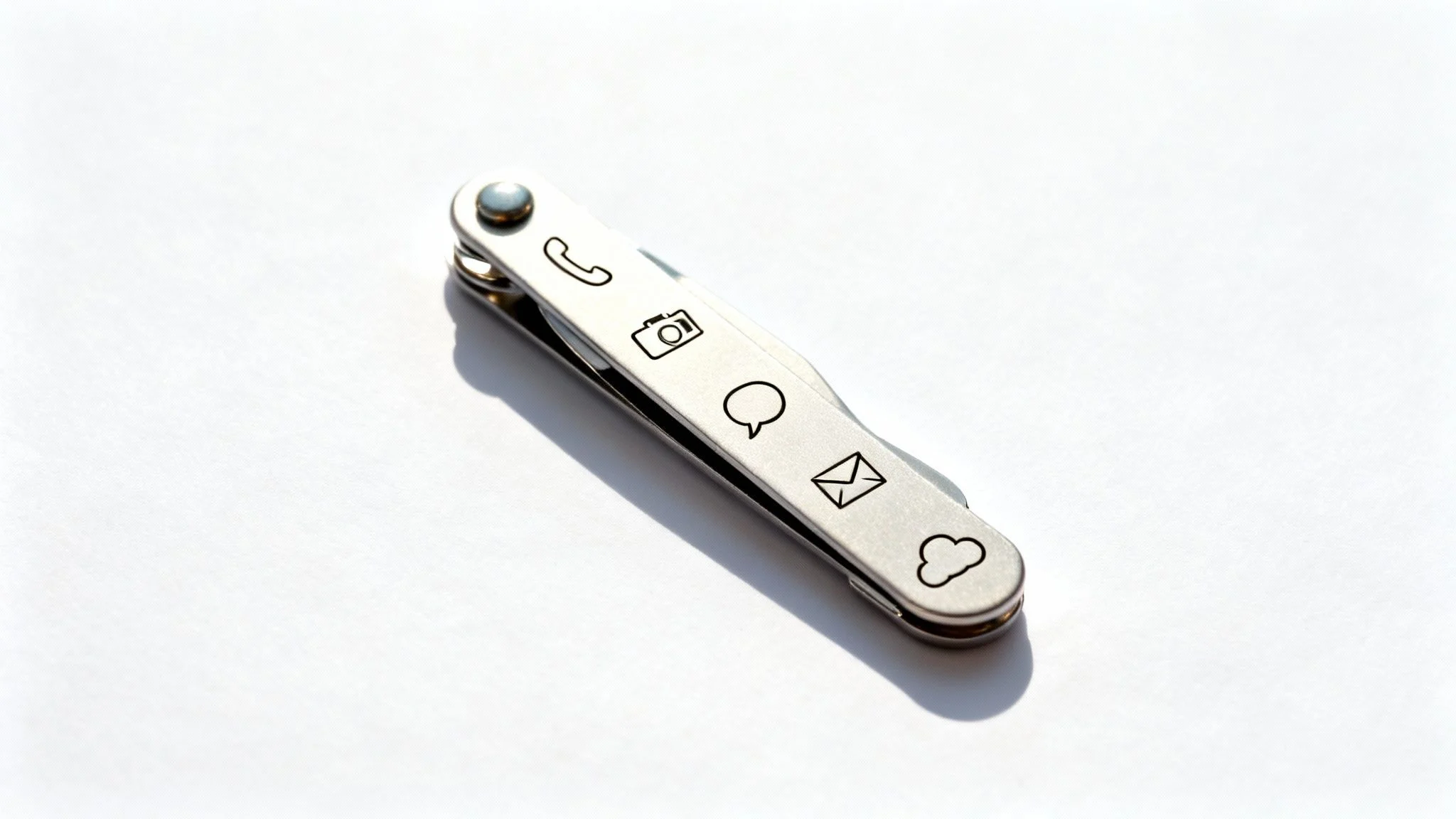 A Swiss Army-style penknife with icons for phone, camera, chat, email, and cloud on the handle, symbolising multifunctional digital tools.